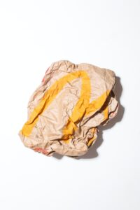 Crunched Mcdonalds paper food bag.