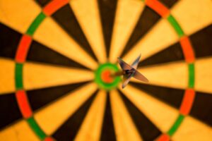 Bullseye dart. To represent goal setting as a part of the Effective Marketing Guide for Small Business
