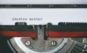 typewriter. 'Stories Matter'